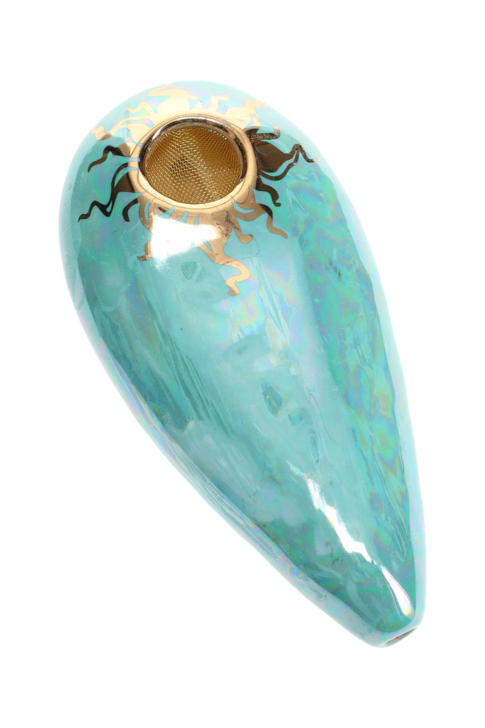 Iced-mint 4″ oval ceramic hand pipe with mother-of-pearl sheen, gold sun accent, and brass screen bowl.