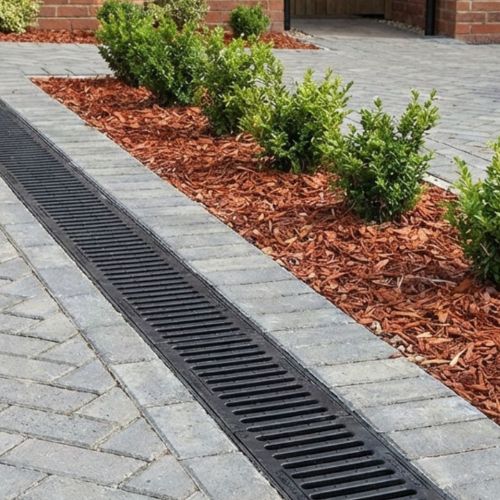 channel grate fitted onto driveway