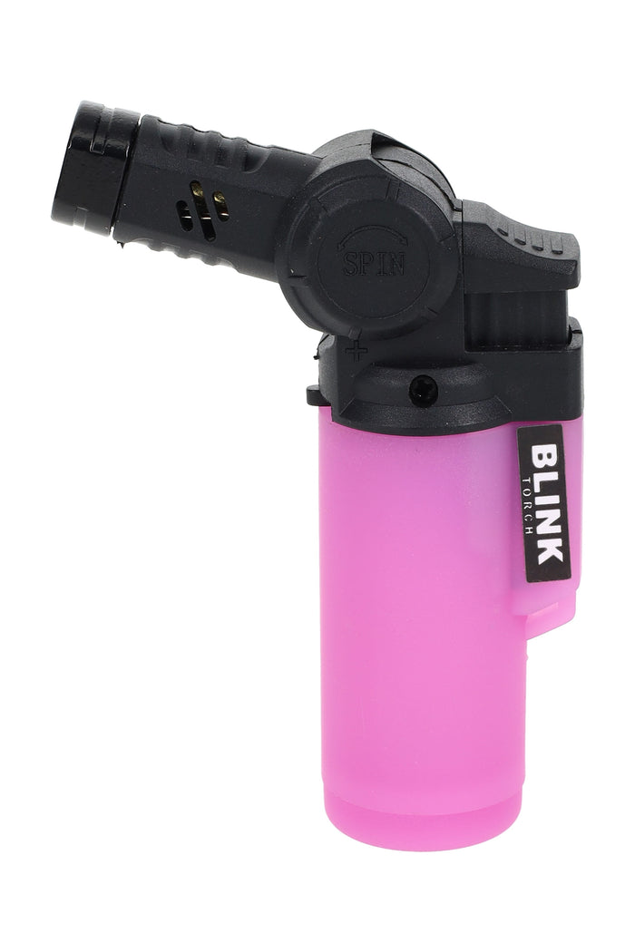 Blink Glow Mini Twisted lighter in soft purple showing pivoting “SPIN” head, flame adjuster, and frosted glow tank, studio close-up.