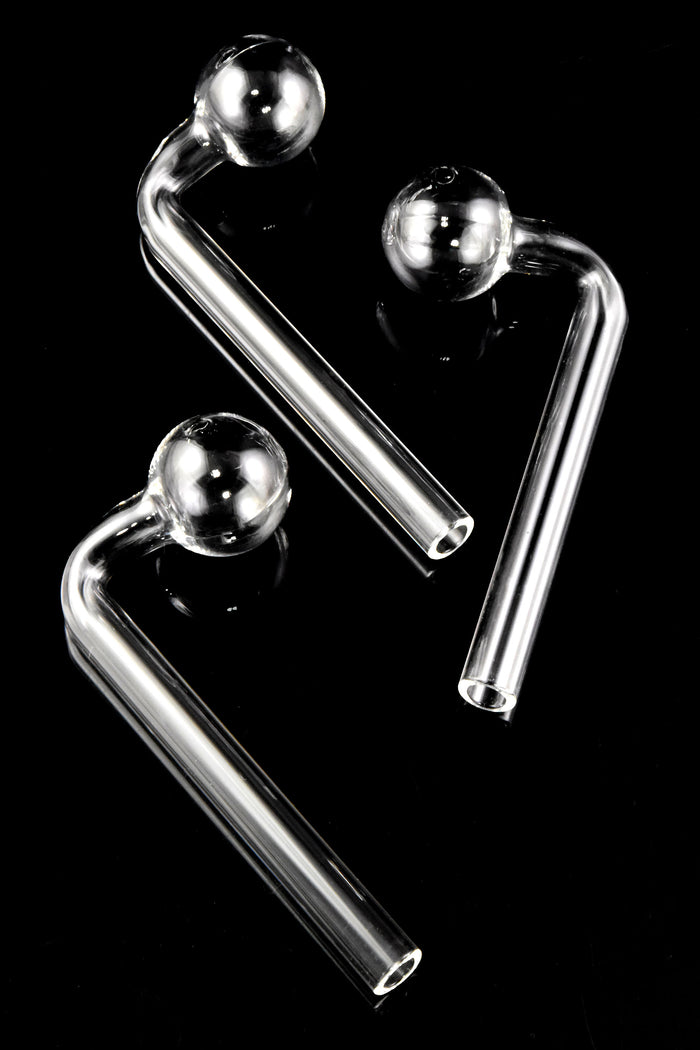 Three clear L-shaped glass oil burners on black background, thick glass with round bowls and open tips, compact 4½″ size for everyday use.