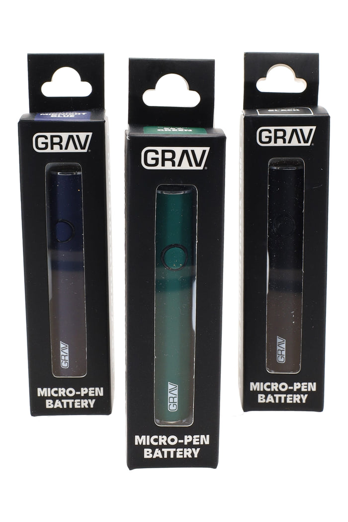 Three boxed GRAV Micro-Pen 510 batteries in black, green, and blue colorways, slim button design visible through window packaging.