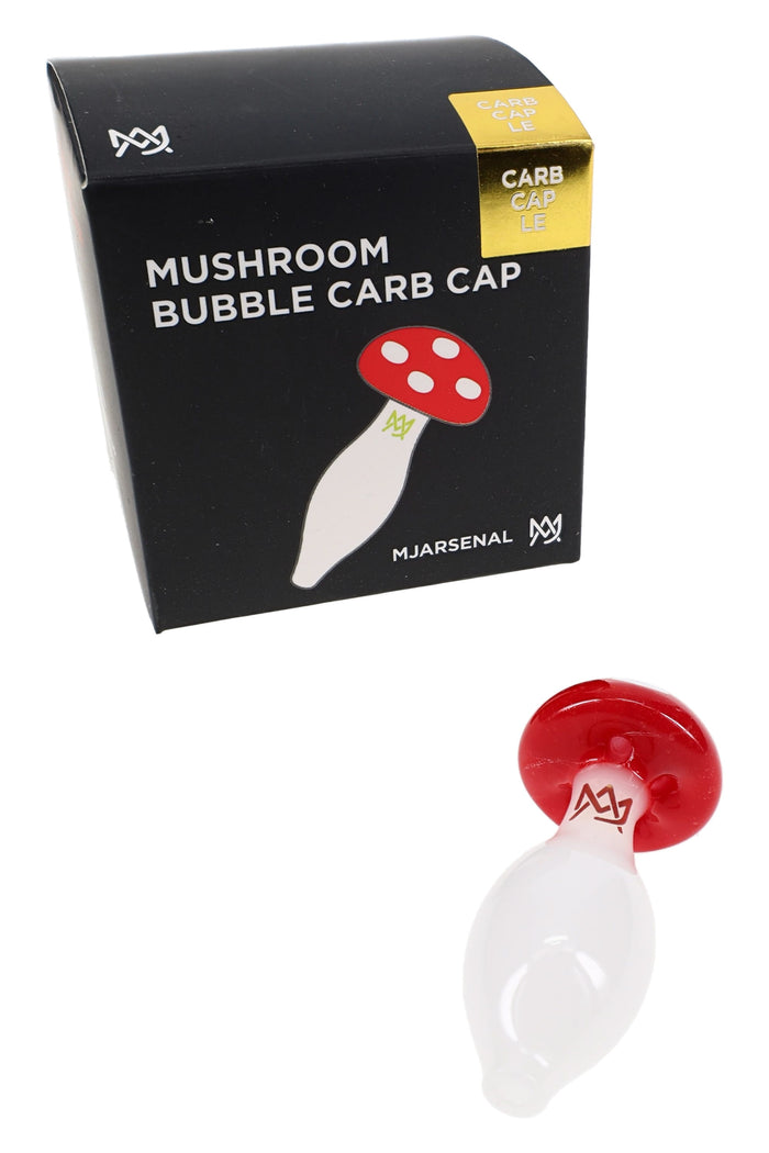MJ Arsenal mushroom bubble carb cap displayed in front of matching black retail box, limited edition toadstool-themed glass dab accessory for flat-top bangers.