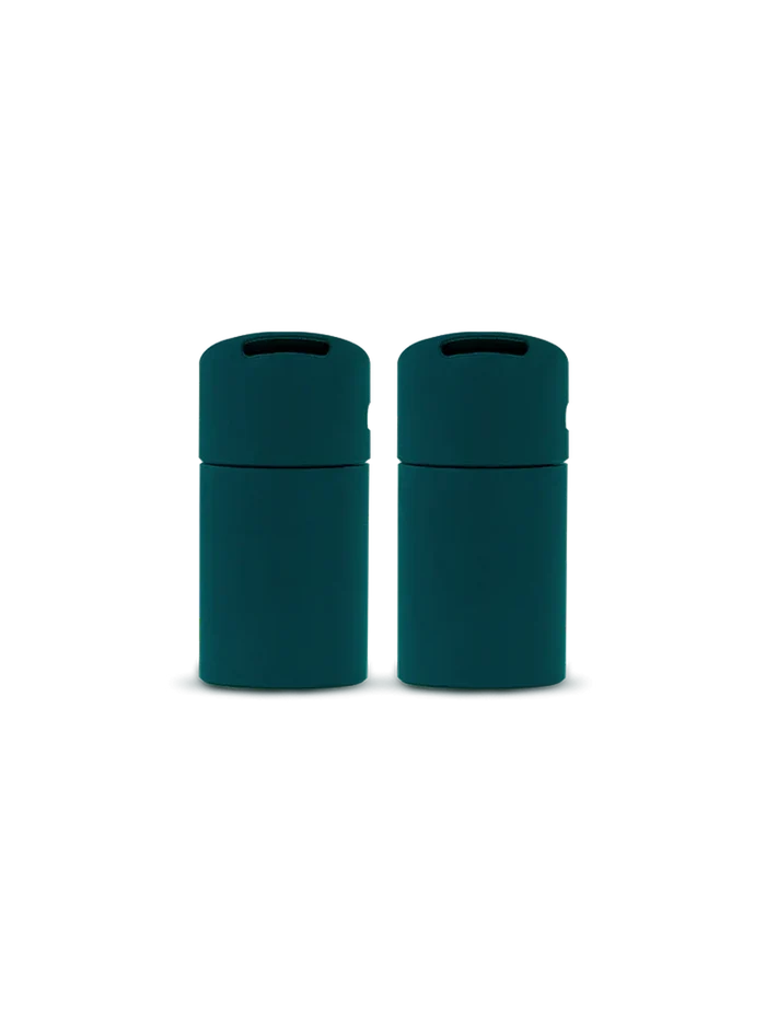 Two Puffco New Peak Pivot mouthpieces in Pine green, oval slot tips shown upright side by side; replacement 2-pack accessory.