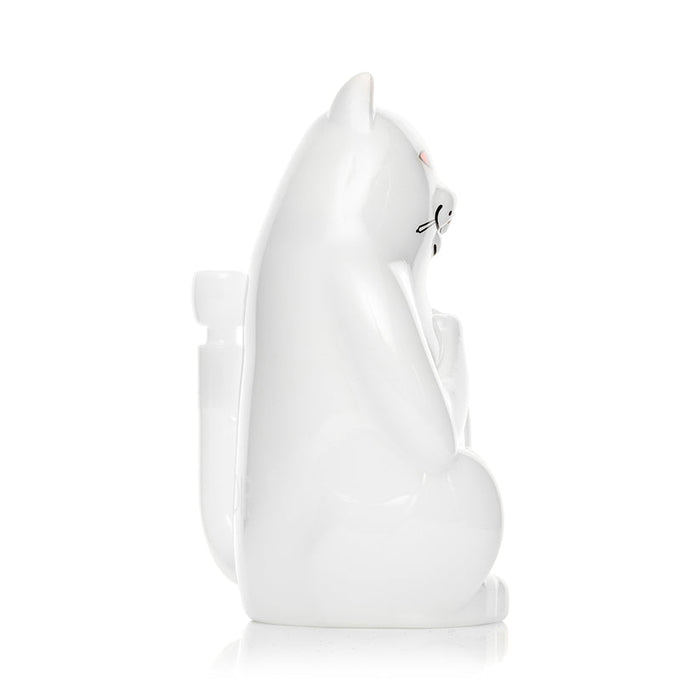 Side profile of RIPNDIP x Hemper High Nermal white cat bong showing smooth glass body and rear tail bowl connection on white background.