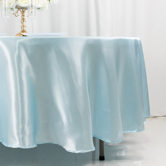 Light blue satin tablecloth draping elegantly over a table.