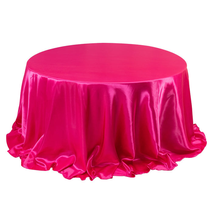 Pink satin round tablecloth with elegant draping.