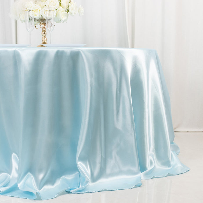 Light blue satin tablecloth draped elegantly over a table.