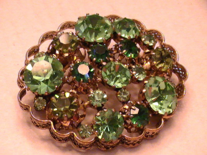 The Queen's Coveted Pin of Wealth