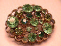 The Queen's Coveted Pin of Wealth