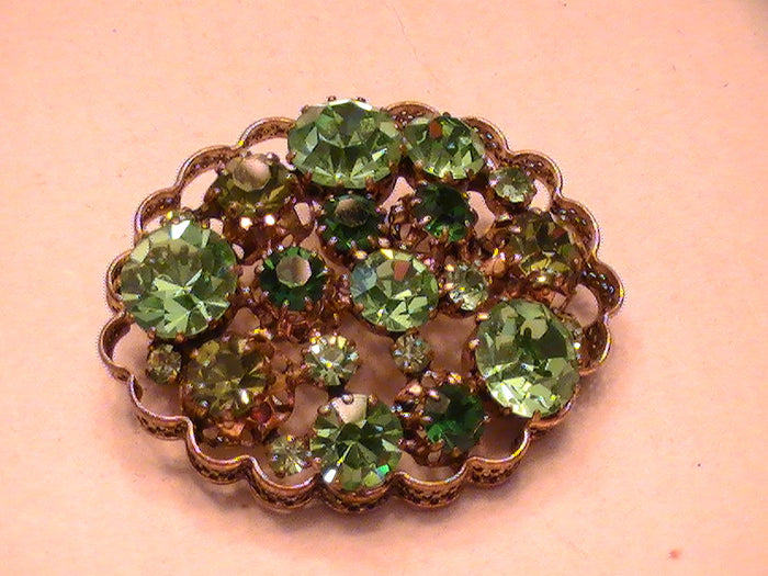 The Queen's Coveted Pin of Wealth